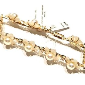 Aproce ar kultivētām pērlēm, perlamutriem 1490-1163