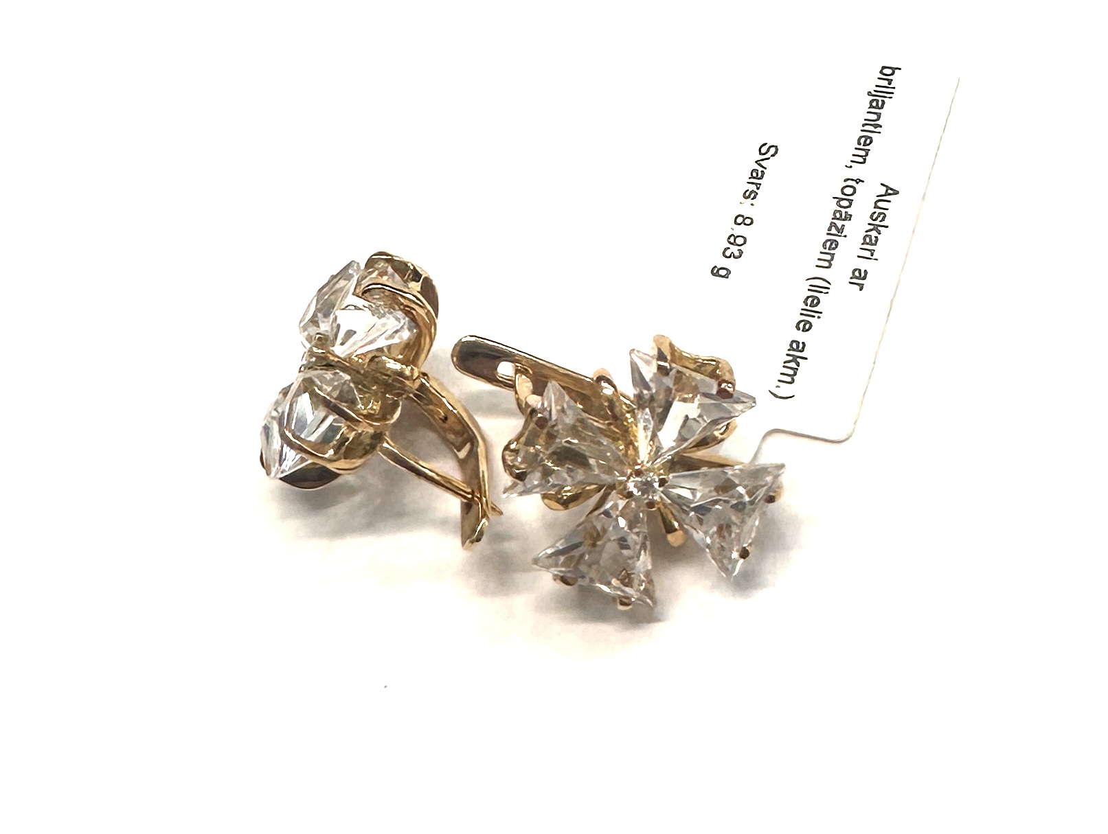 Auskari ar briljantiem (0.06ct), topāziem 28951-0751. Rezervēts līdz 25.02.2026